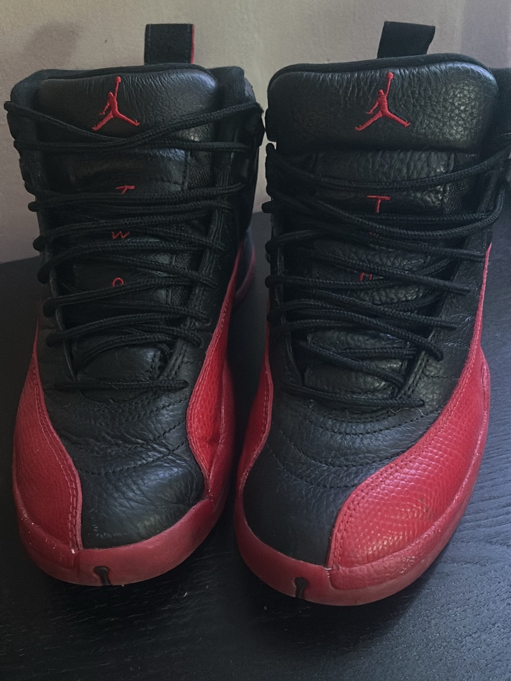 Jordan 12 ‘flu game’/red and black